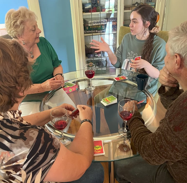 group playing cards at Main Street House