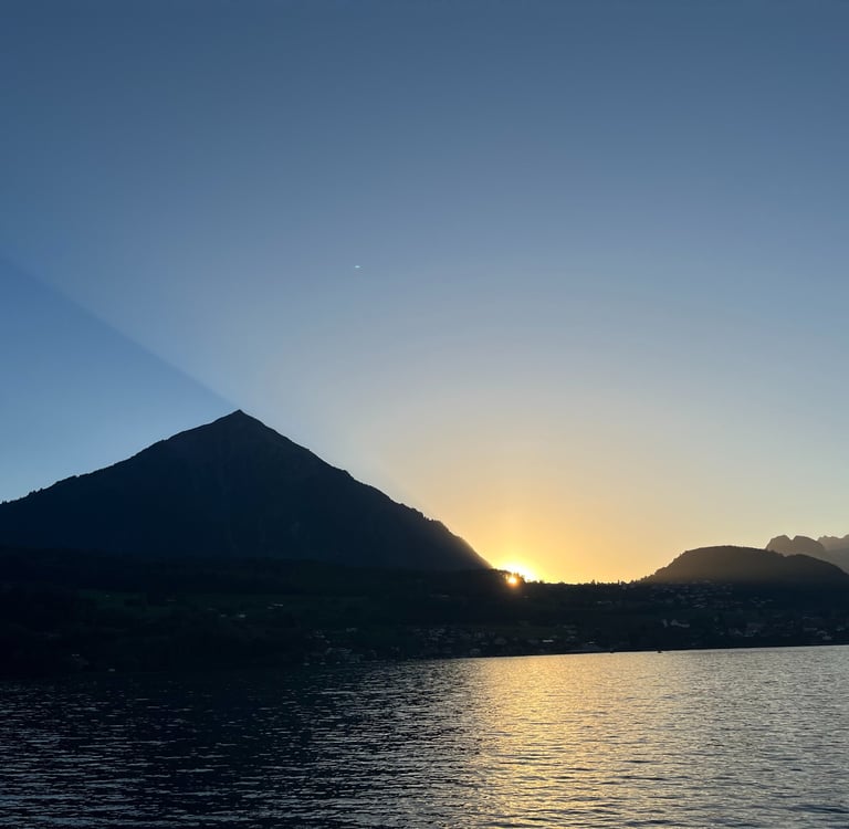 Niesen casting a shadow over Lake Thun