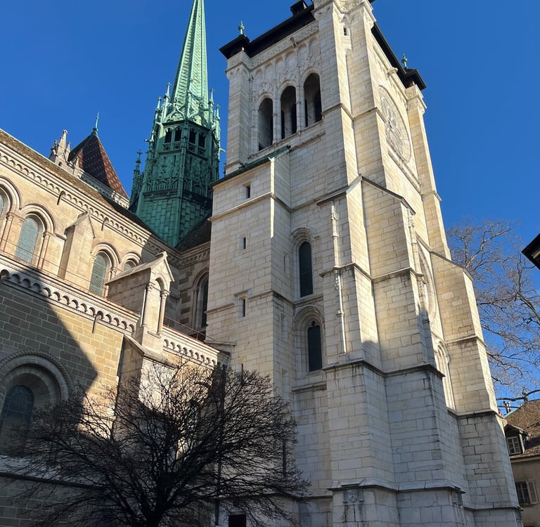 A view looking up at the tower of St. Pierre Cathedral in Geneva, Switzerland
