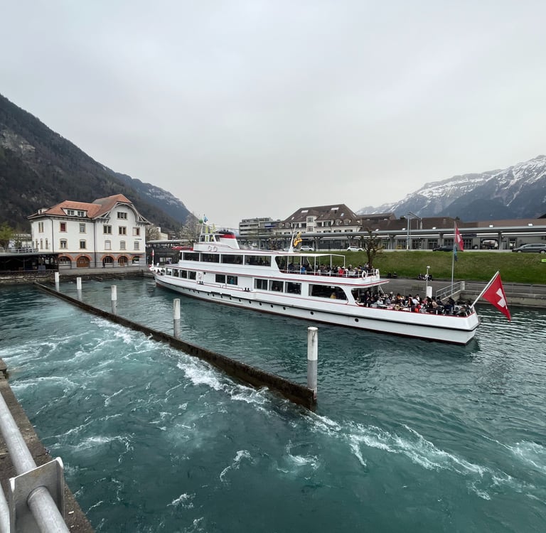 View of the end of the Interlaken Ship Canal with the Motor Vessel Beatus loading passengers.
