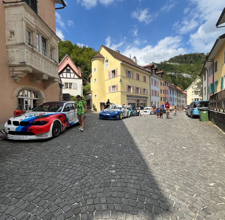Race cars lined up in St. Ursanne in the Swiss Canton of Jura