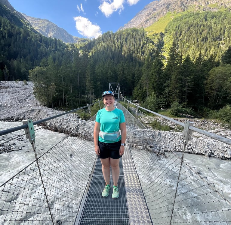 Corinne from Hidden Switzerland Travel crossing the Kander River in the Gasterntal