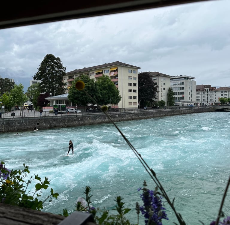 Surfers on the Aare River in Thun Switzerland
