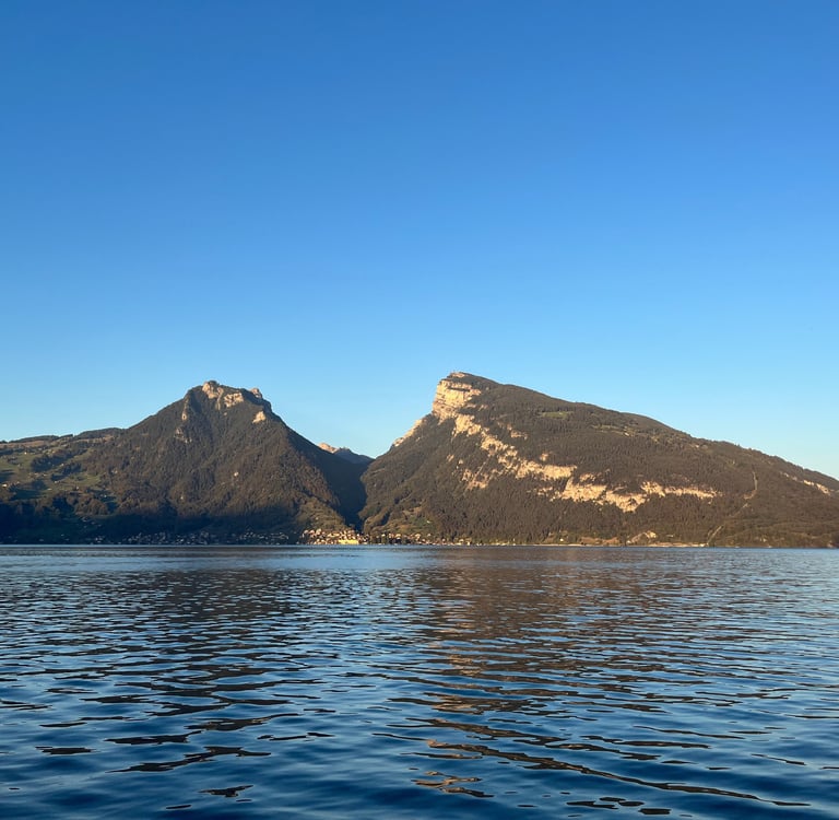 View of Niederhorn and the Justistal from across Lake Thun