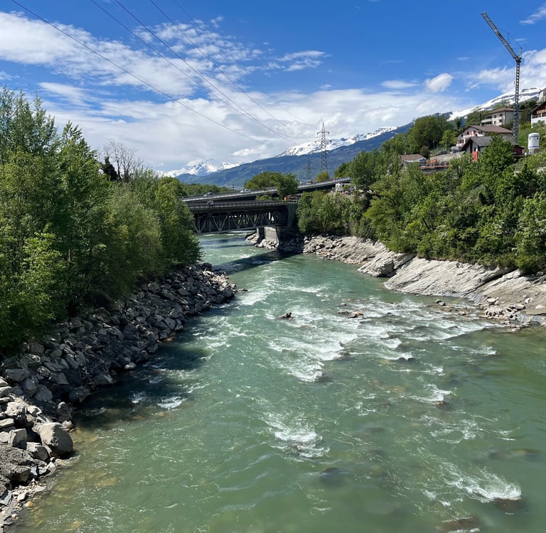 Looking down the Rhône River in the town of Leuk