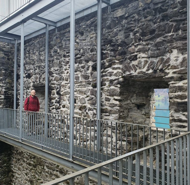 Colin from Hidden Switzerland Travel inside of the Ringgenberg Castle ruins
