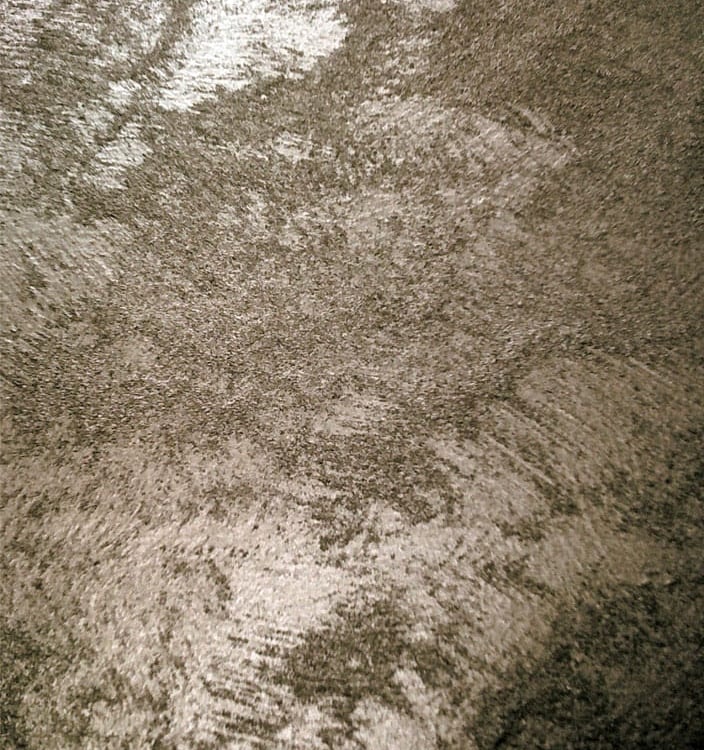 A warm silver paint sample showing its lustre and beautiful grainy texture.