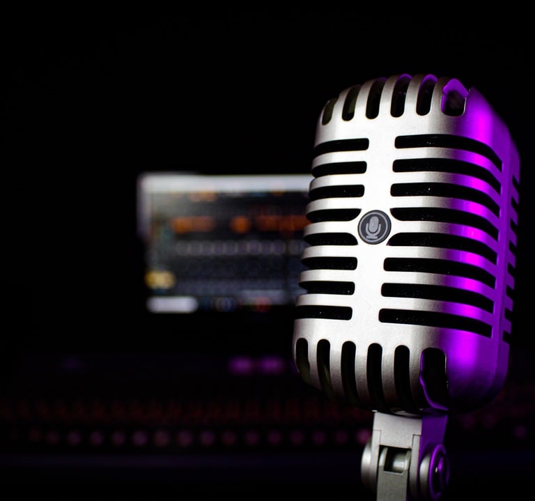 old microphone in recording studio with purple glow