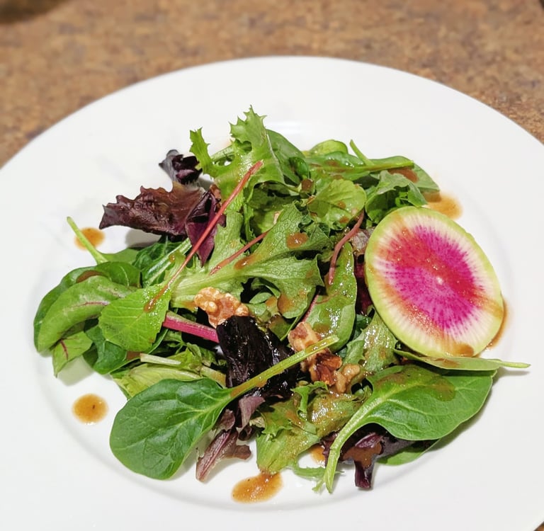 baby greens salad with watermelon radish & balsalmic dressing. Portland gluten free dairy-free vegan