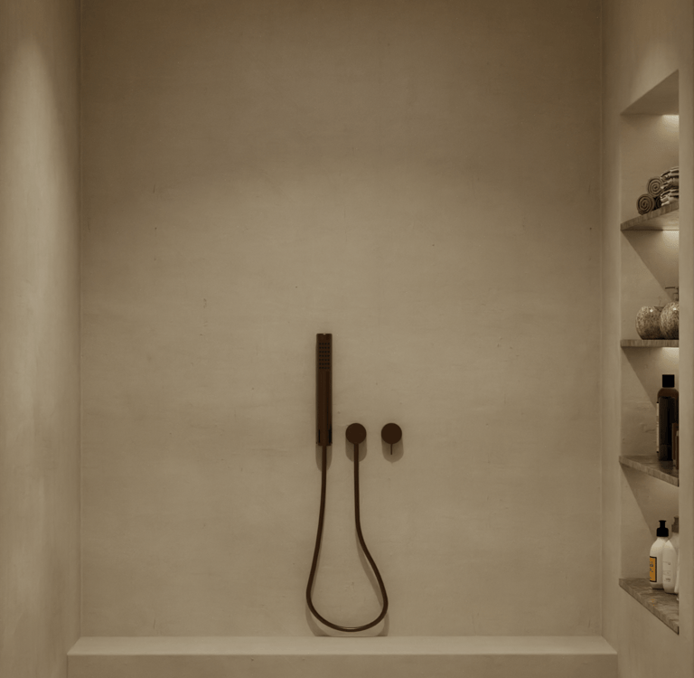 Minimalist shower area with shelves and a handheld showerhead.