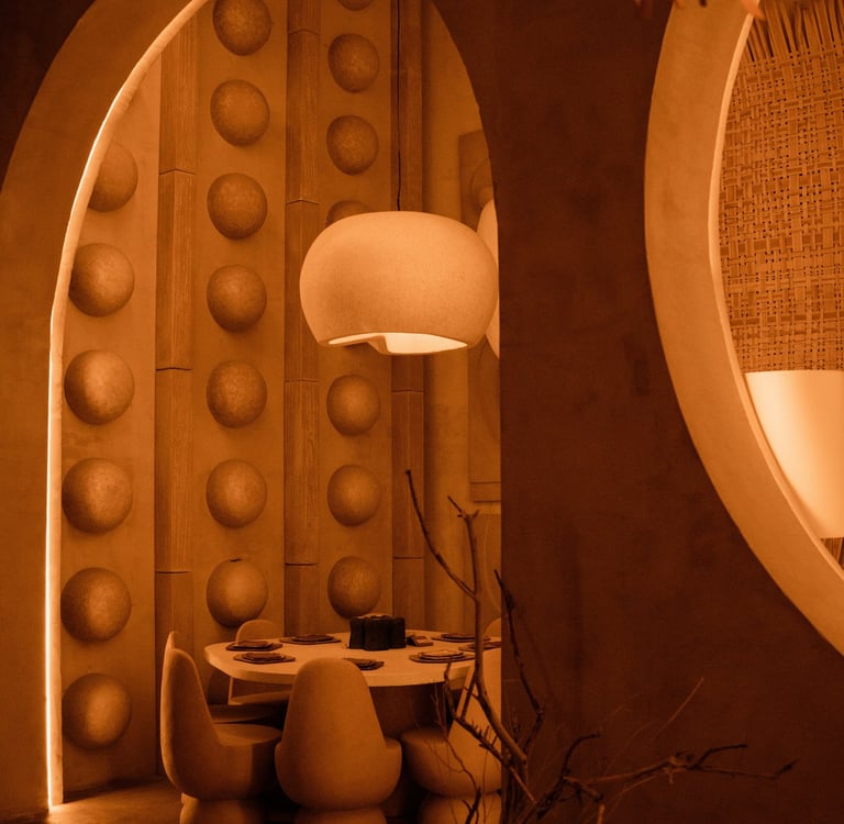 Sculptural terracotta interior niche with arched forms and warm ambient lighting