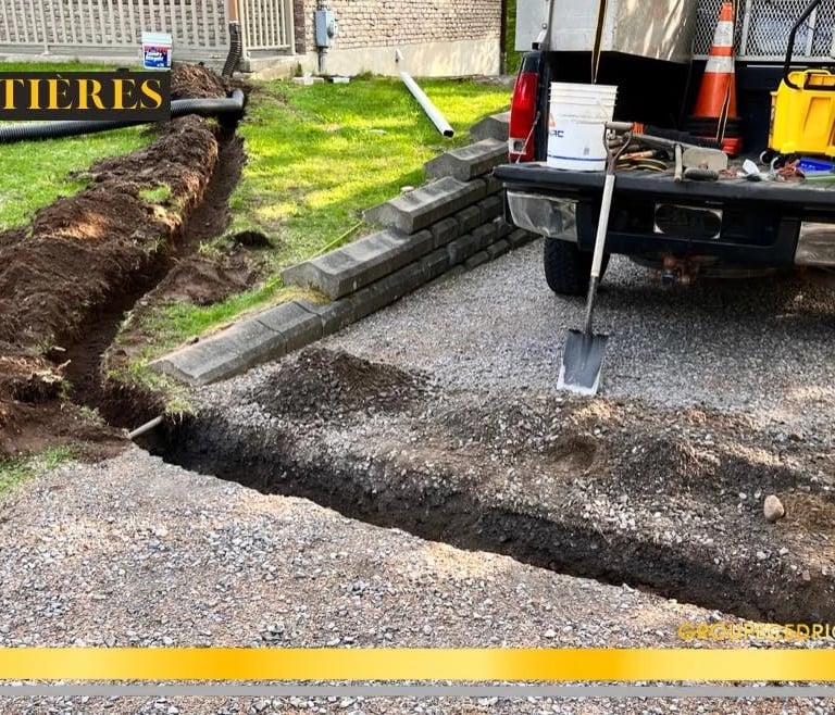 Nettoyage de gouttières à Québec et installation de drains de surface – préparati