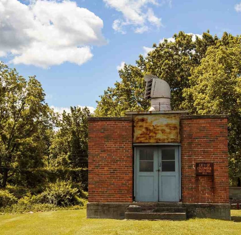 Well pump house on a Black Forest acreage property, a common moisture point checked during mold inspections