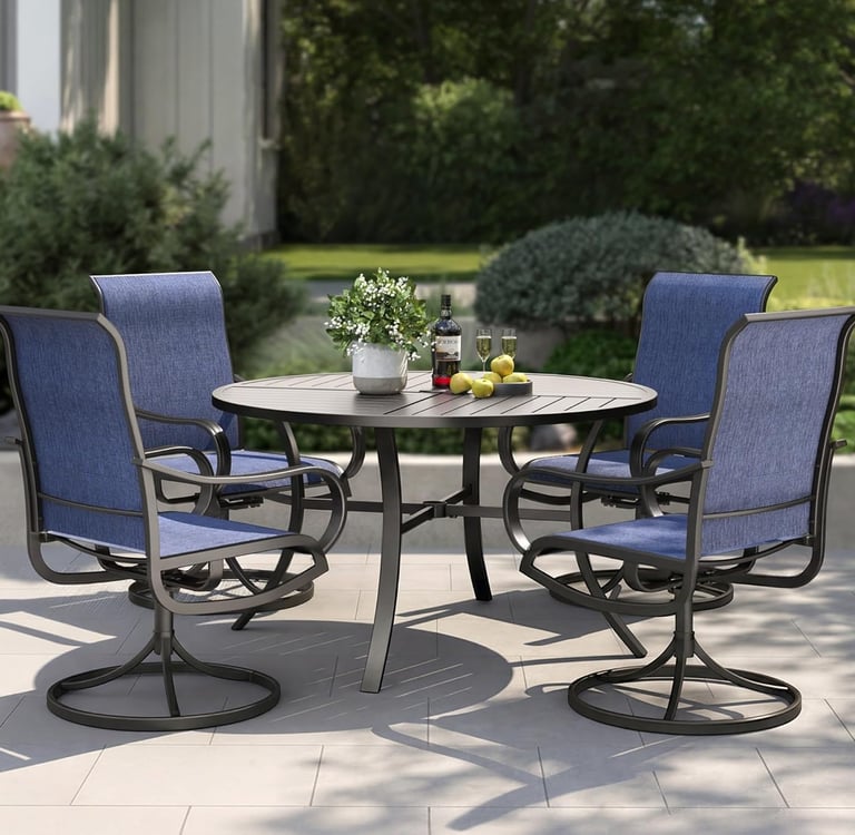 A 5-piece outdoor dining set with a round metal table and four blue swivel chairs on a garden patio.