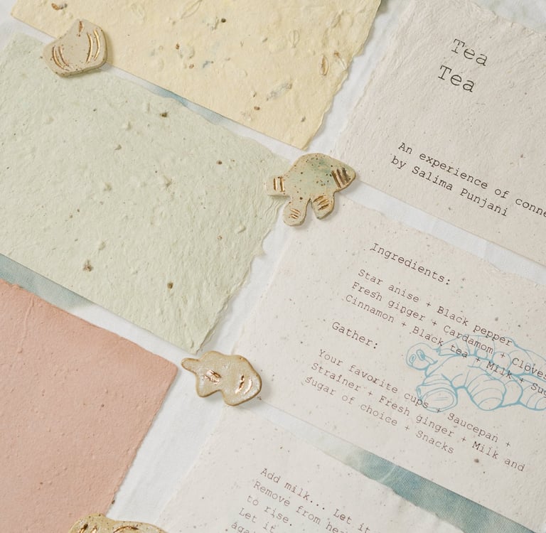 Handmade paper and ceramics. The paper has different chai spices in it.