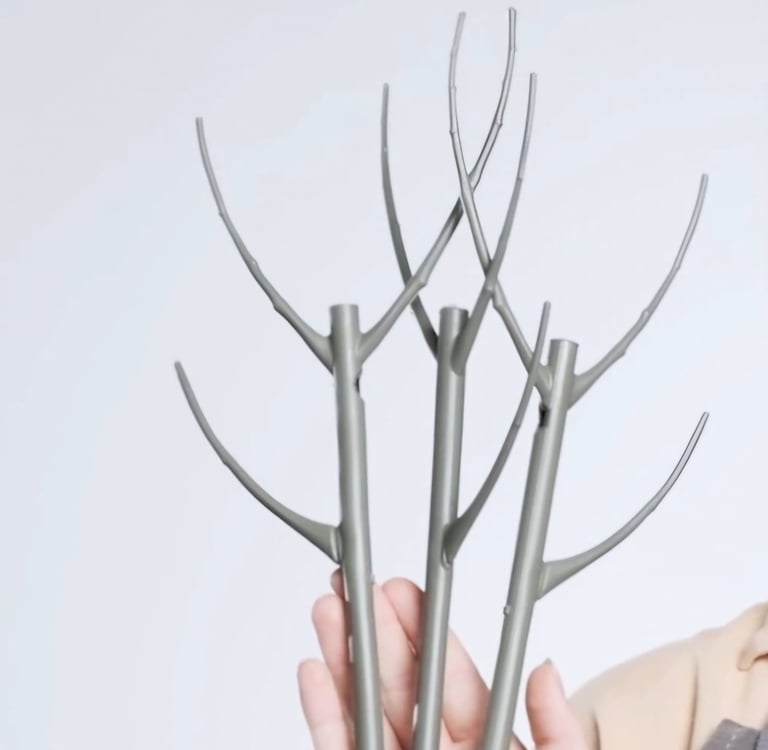 Branch-style plant support stakes used to stabilize indoor houseplant stems and encourage growth