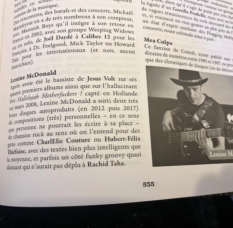 Photo d'une page intérieure de l'encyclopédie ou se trouve Lenine Mc Donald