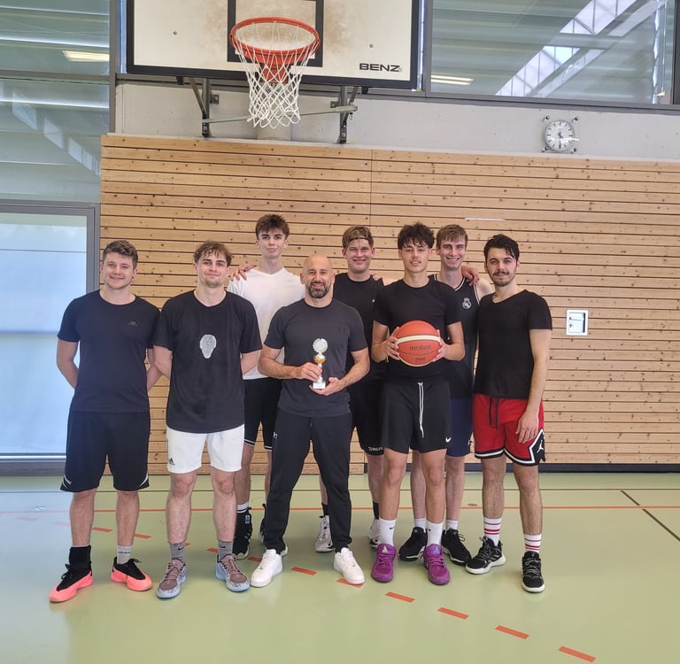 alt="MTV Karlsruhe basketball team after winning third place at BGK Cup."