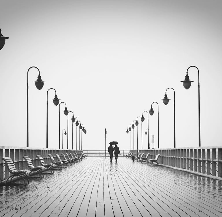 Photo by Pixabay: https://www.pexels.com/photo/two-people-walking-on-pier-220836/
