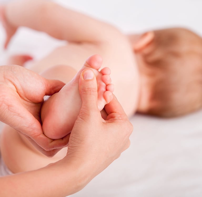 a baby's feet and feet are shown in this picture