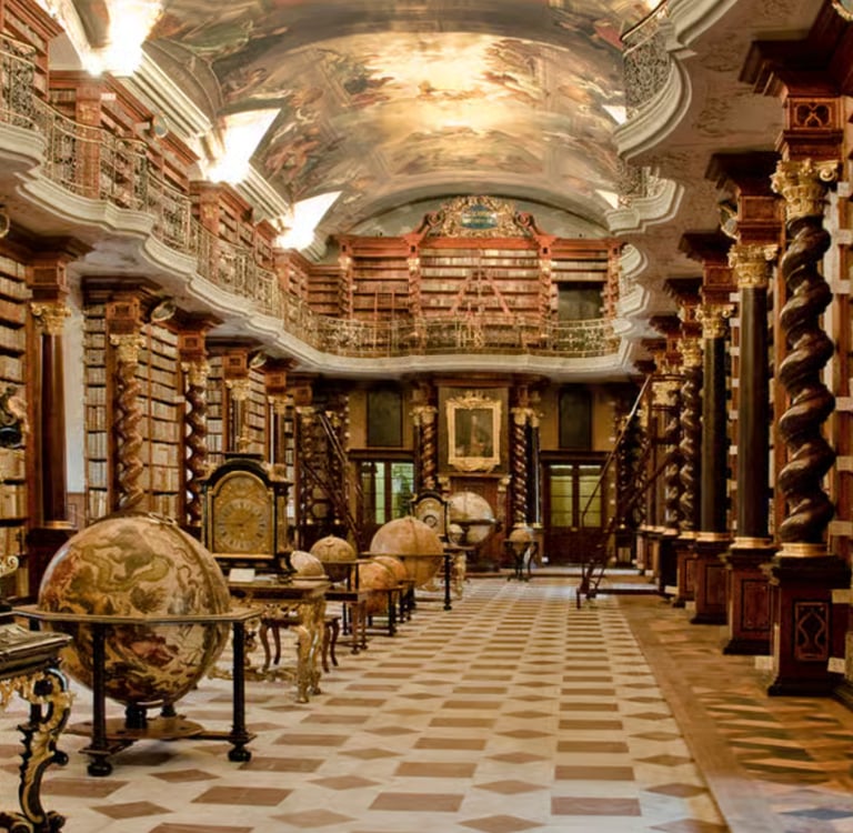 Baroque library hall with ornate wooden shelves, globes, and a frescoed ceiling.