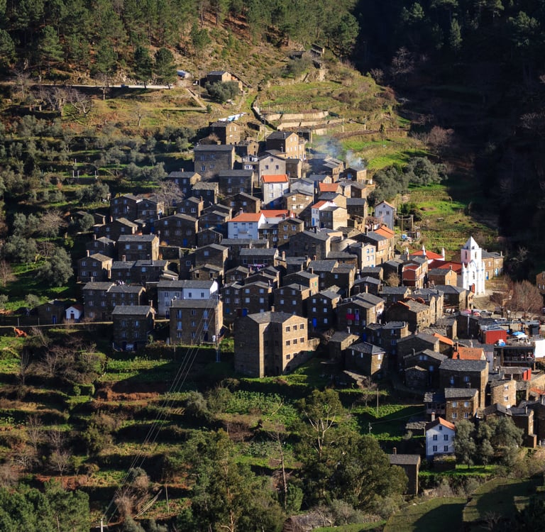 Stone schist village of Piodao nestled in the green Serra da Estrela mountains of Portugal.