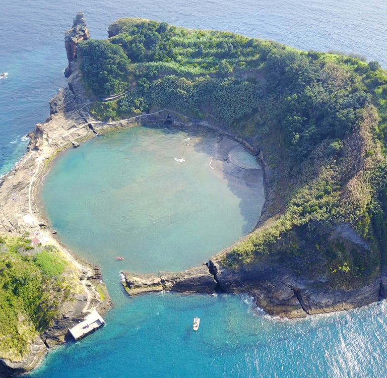 Aerial view of Vila Franca do Campo islet in the Azores featuring a circular volcanic crater lagoon.