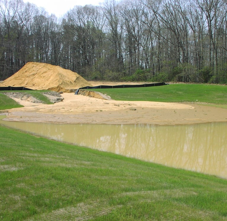 Dirt eroding into a basin.