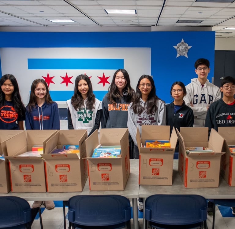 The CTYL Team was hard at work sorting books for our book drive for flooded schools in Thailand.