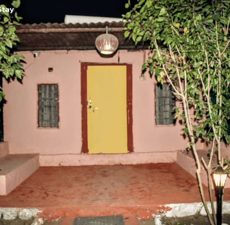 Traditional mud house stay at Jungle Lore Resort with rustic interior