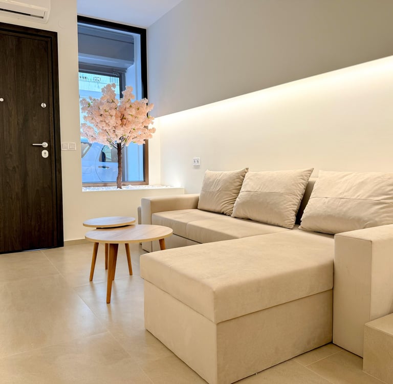 Ground floor - Living room with Sofa bed and 58' 4K TV.