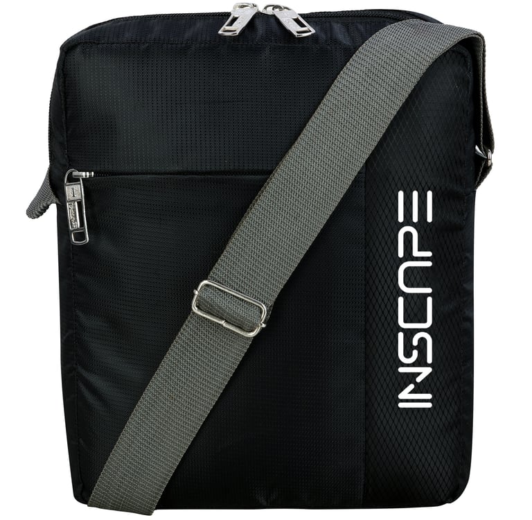 a black and white sling bag with a grey strap