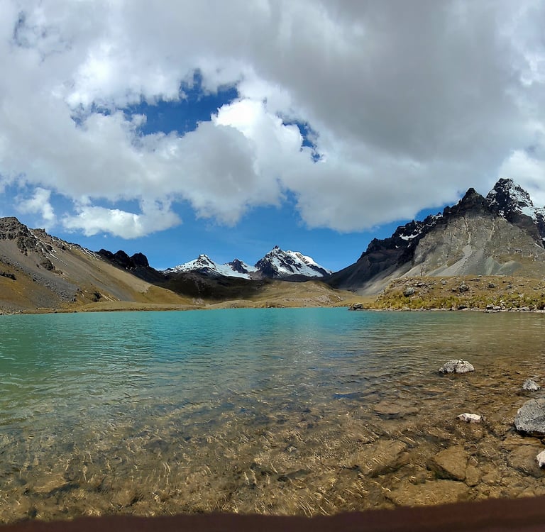 a lake with a mountain in the background