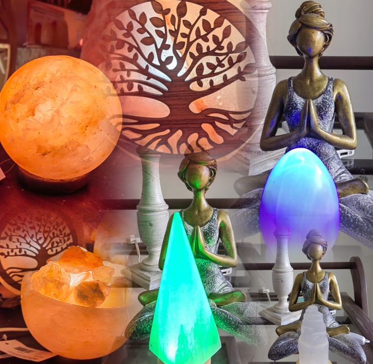 a collection of various hymalayan salt lamps and selenite lamos and fluorite lamps