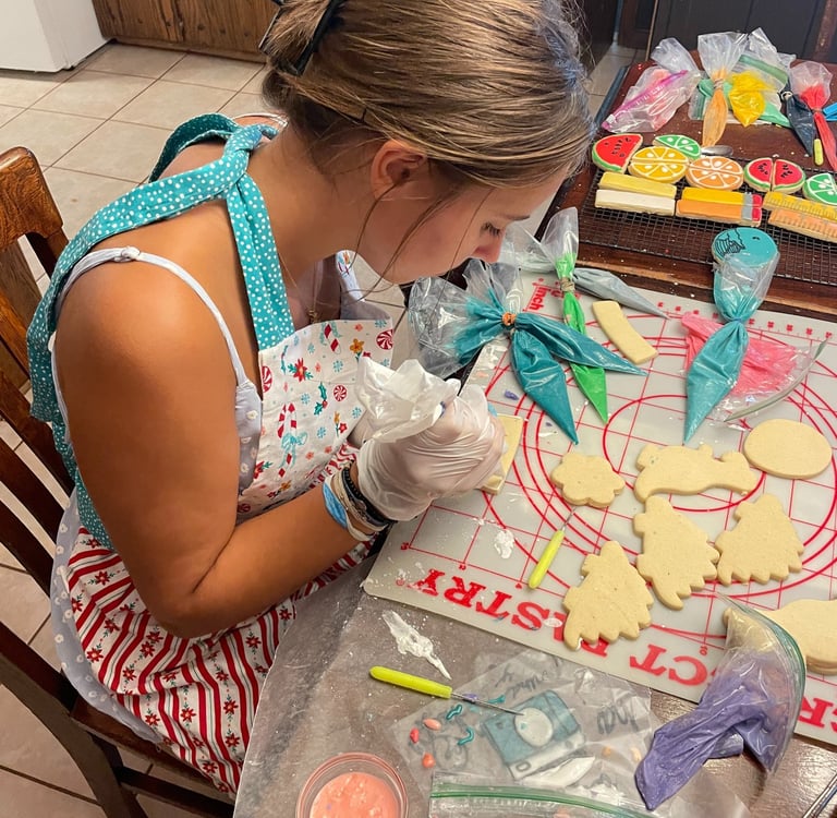 A Real in the moment photo of what it looks like to decorate these cookies