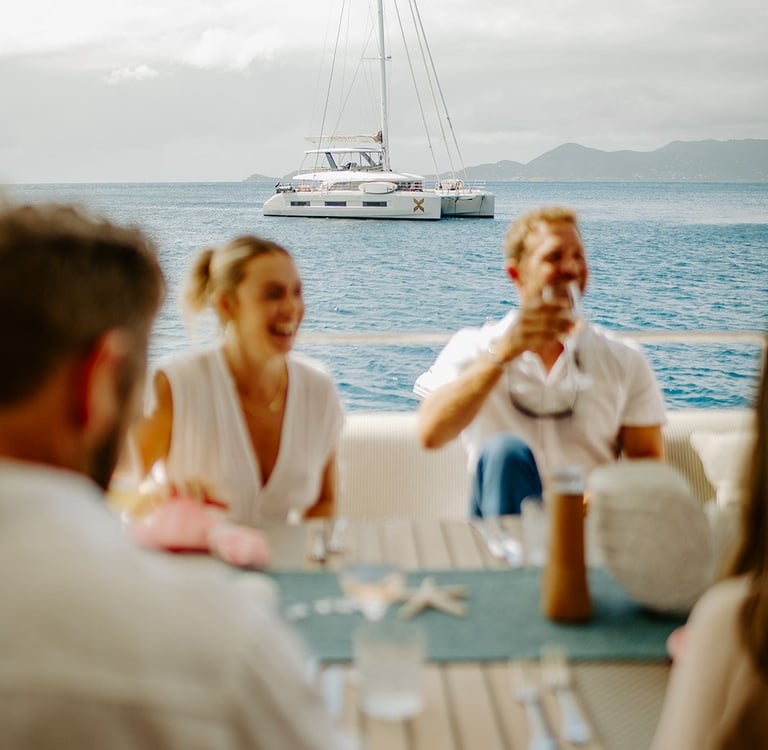 a group of people sitting around a table