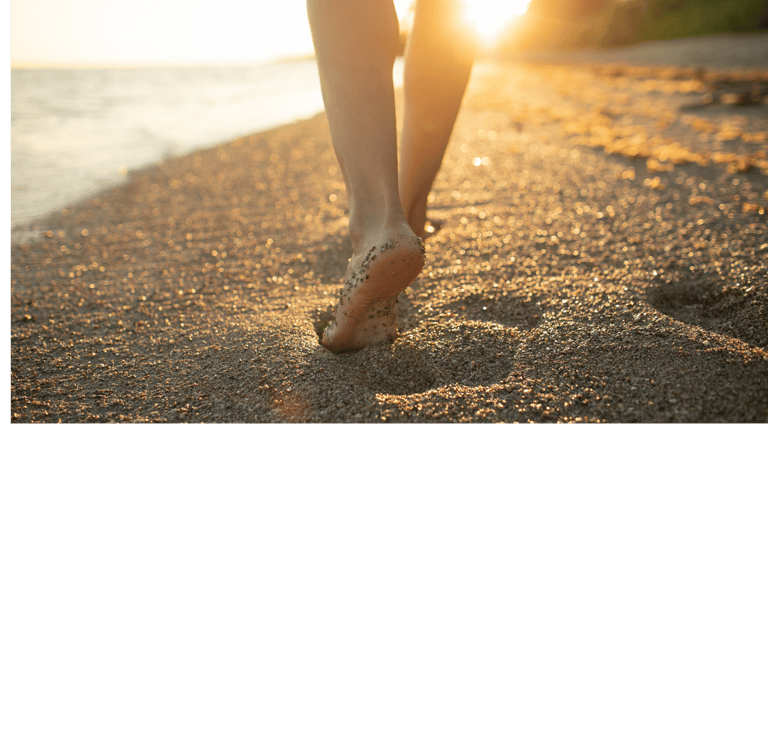 Walking barefoot on the beach is an example of grounding.