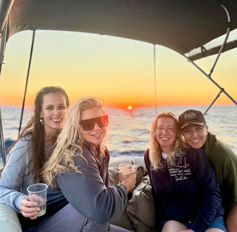 Girls enjoying and smiling at private Sunset Tour Experience on the Adriatic Sea near Split, Croatia