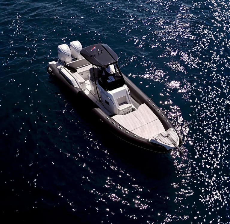 Aerial of Nuova Jolly Prince 30 Exclusive with twin Yamaha 250s and hard top cruising the Adriatic Sea near Split.