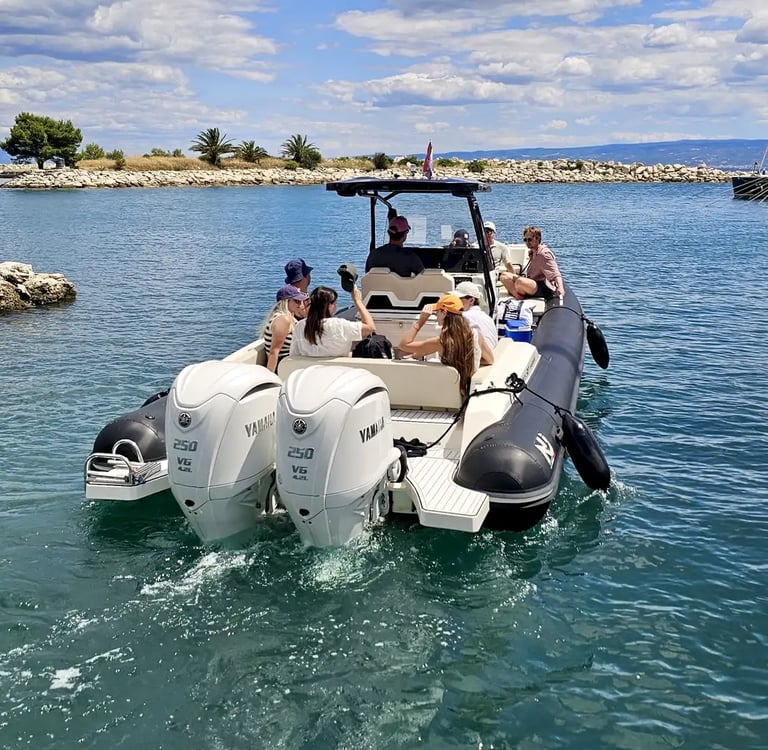 Guests departing from the dock at Marin Agents for a private boat tour from Split aboard a Nuova Jolly RIB speedboat