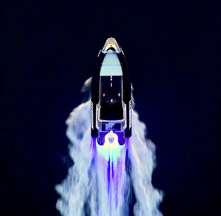 Hunter Pro 800 RIB speedboat cruising at night with underwater lights and ambient deck lighting captured from above
