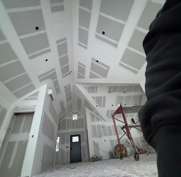 custom drywall for high pointed ceilings in home in the West Metro