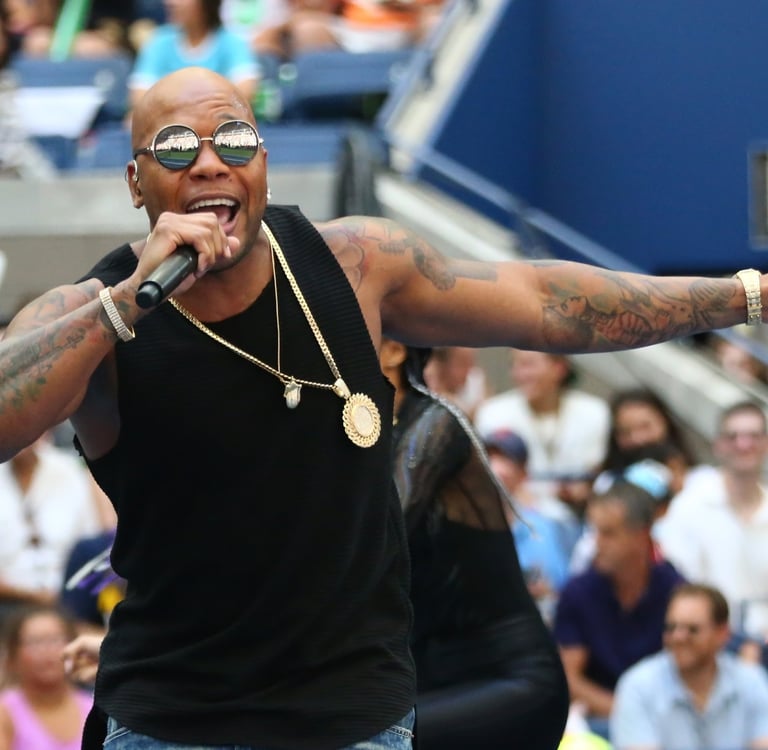 Flo Rida rapper in black t-shirt on stage