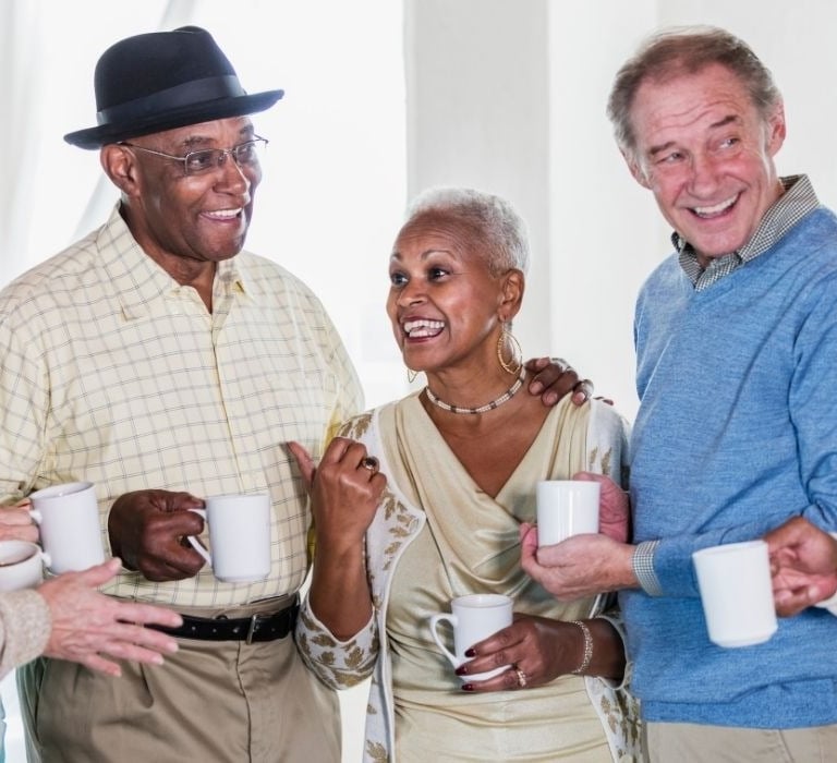 group of seniors drinking coffee
