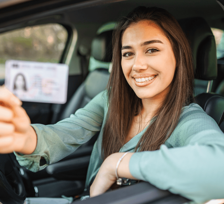 new florida resident showing her driver's license