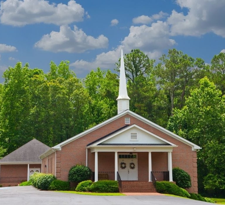 red brick church with steeple