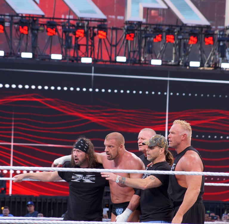 shawn Michaels with other fighters in ring