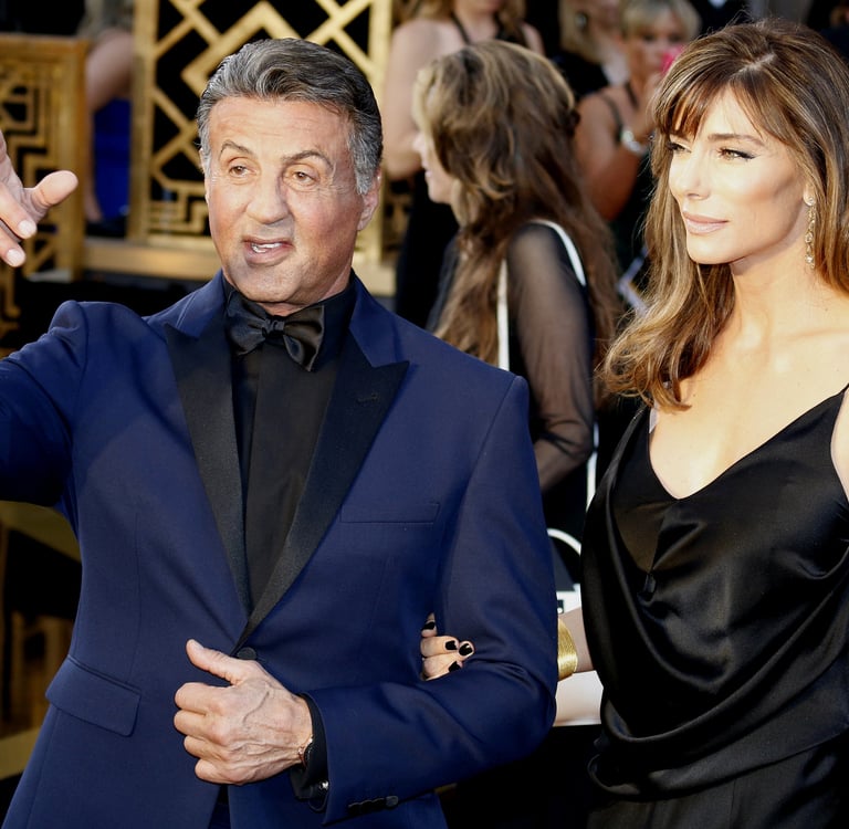 sylvester stallone with wife at event