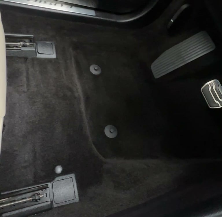 professionally interior detailed car floor carpet that has been shampooed