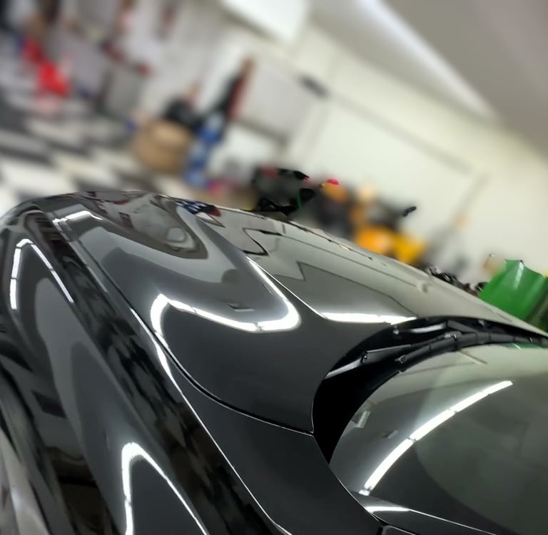 shiny black luxury suv after mobile detailing in ct